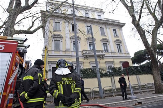 Firefighters stand outside the Greek Embassy in Rome, Monday, Dec. 27, 2010. A package bomb was found at the Greek Embassy in Rome on Monday, four days after similar mail bombs exploded at two other embassies injuring two people. The device was defused and no one was injured. Carabinieri Col. Maurizio Mezzavilla said the parcel bomb at the Greek Embassy was similar to the ones that exploded Thursday at the Chilean and Swiss embassies. An anarchist group with reported ties to Greek anarchists claimed responsibility for those blasts. (AP Photo/Andrew Medichini)